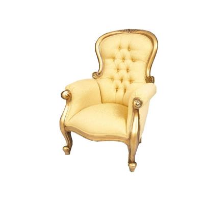 Fauteuil Chesterfield style victorien en acajou doré à la feuille