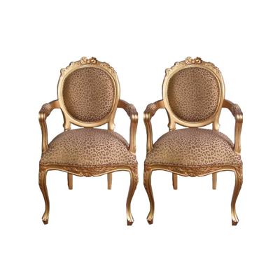 2 fauteuils médaillon style Louis XV en acajou doré à la feuille